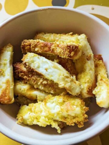 Halloumi fries in a white bowl