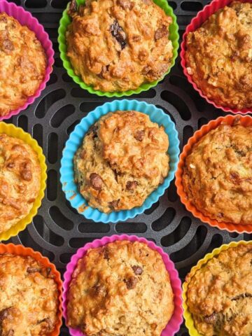 Banana muffins in an air fryer basket.